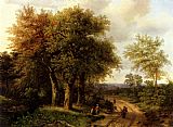 Travellers Resting On A Wooded Path by Marianus Adrianus Koekkoek